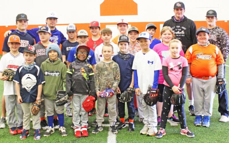 THS grads host baseball camp