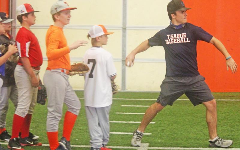 THS grads host baseball camp