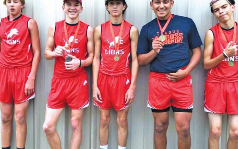 Nine runners medal in cross-country meet
